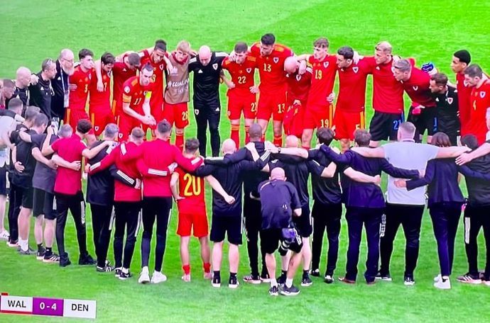 Wales' post-match huddle