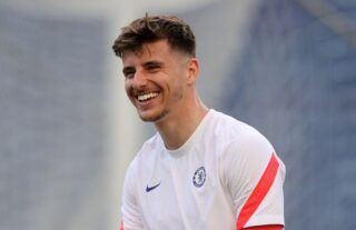Chelsea midfielder Mason Mount smiling in training