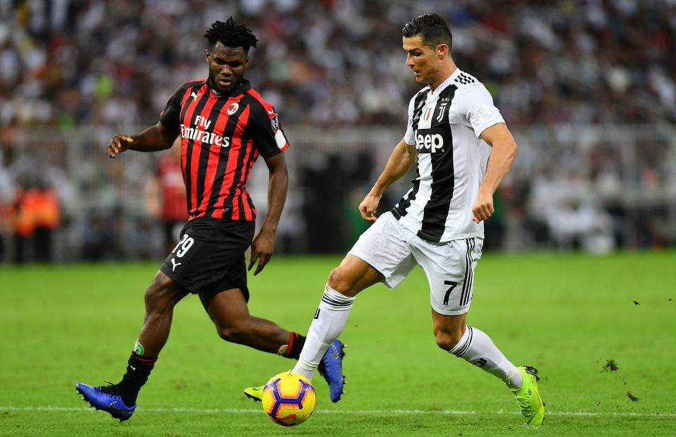 Franck Kessie in action for AC Milan against Cristiano Ronaldo amid speculation over a move to Tottenham for the Ivorian