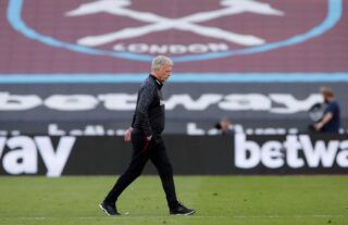 West Ham manager David Moyes walking across the pitch
