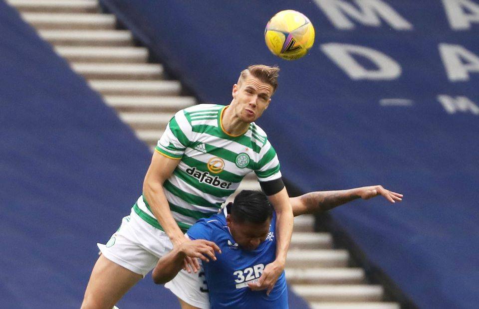 Celtic centre-back Kristoffer Ajer wins a header versus Rangers