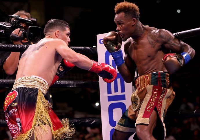 Jermell Charlo blocks a punch from Brian Castano