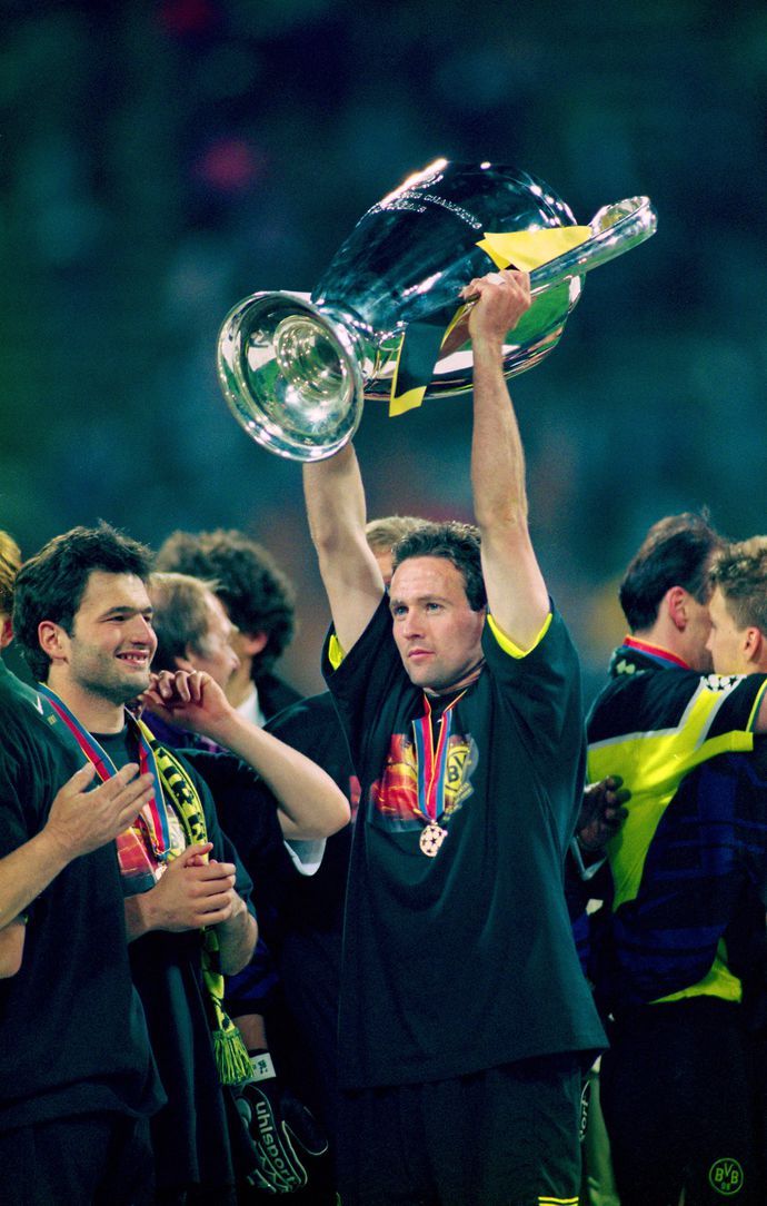Lambert with the CL trophy