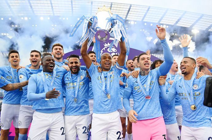  Fernandinho lifts the Premier League title with Manchester City