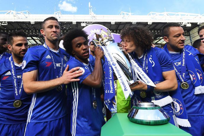 Willian celebrates winning the Premier League with Chelsea