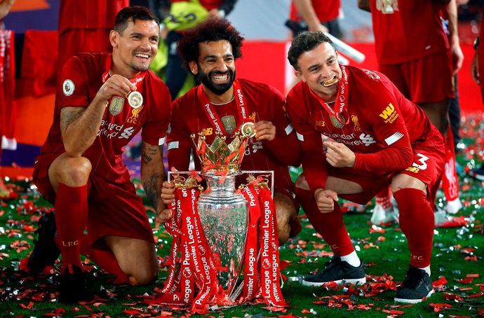 Xherdan Shaqiri celebrates winning the Premier League with Liverpool