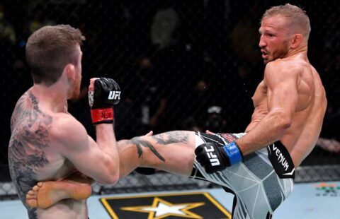 TJ Dillashaw kicks Cory Sandhagen in the main event of UFC Vegas 32 at the UFC Apex in Las Vegas