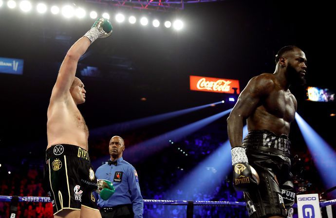 Tyson Fury and Deontay Wilder in action during their second boxing fight