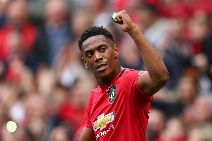Anthony Martial waves to the Old Trafford crowd 