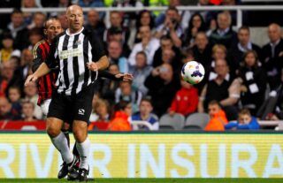 Alan Shearer in action for a Newcastle legends side