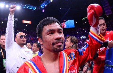 Manny Pacquiao raising his fist to the crowd