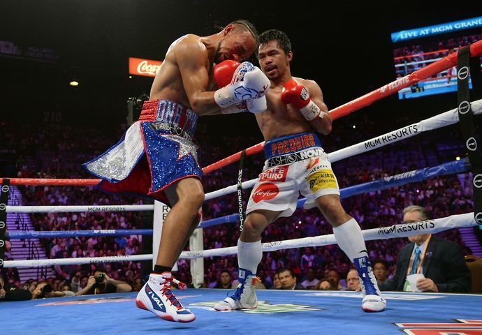 Manny Pacquiao punches Keith Thurman