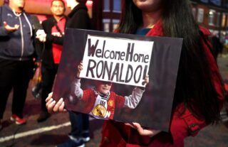 A Manchester United fan welcomes back Cristiano Ronaldo when Juventus visit in the Champions League