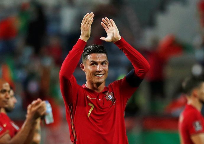 Cristiano Ronaldo celebrates breaking the international men's goalscoring record with Portugal against the Republic of Ireland