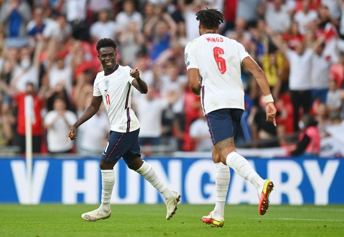 Bukayo Saka and Tyrone Mings during England 4-0 Andorra