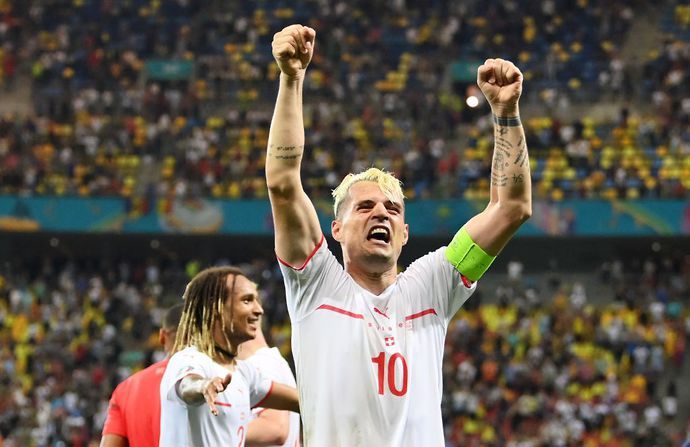 Granit Xhaka celebrates after Switzerland beat France at Euro 2020