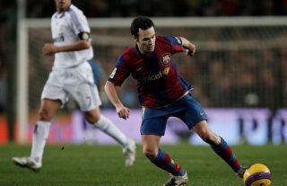 Andres Iniesta playing for Barcelona against Real Madrid in 2007