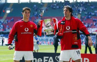 Cristiano Ronaldo lifts the FA Cup for Manchester United in 2004