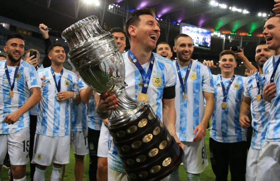 Lionel Messi with the Copa America trophy