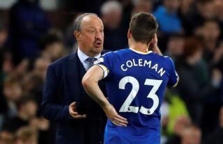 Everton manager Rafael Benitez in conversation with Seamus Coleman