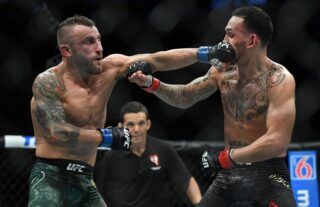 What happened the first time Alexander Volkanovski and Max Holloway fought?