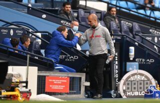 Thomas Tuchel and Pep Guardiola embrace before Manchester City play against Chelsea in the Premier League at The Etihad Stadium