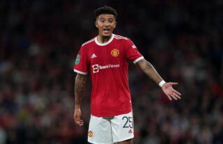 Jadon Sancho playing for Manchester United against West Ham at Old Trafford in the Carabao Cup
