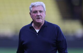Newcastle manager Steve Bruce looking into the distance