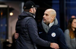 Jurgen Klopp in discussions with Pep Guardiola