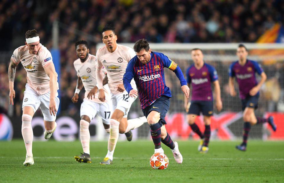 Lionel Messi playing for Barcelona against Manchester United in the Champions League