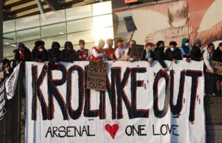 Arsenal fans protesting against Stan Kroenke