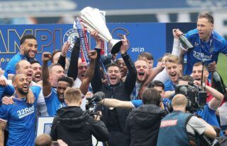 Rangers boss Steven Gerrard holds the Scottish Premiership title aloft