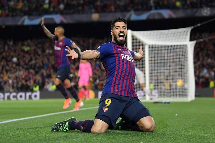 Barcelona's Luis Suarez celebrating against Liverpool