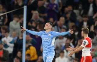 Man City's Phil Foden celebrates scoring a goal