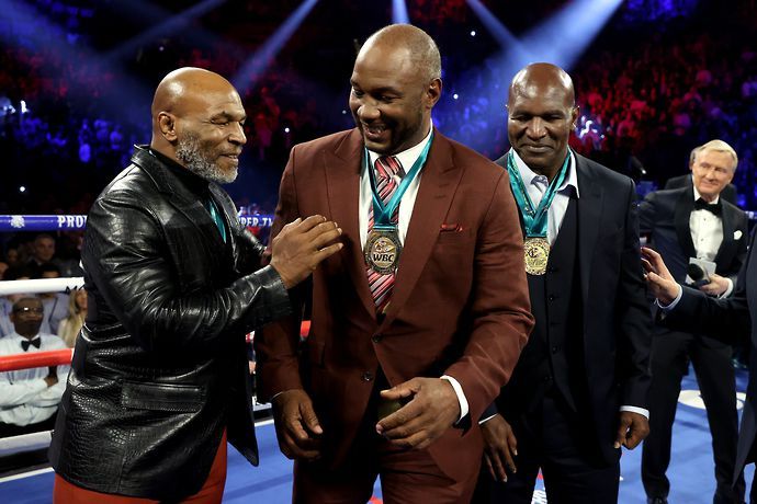 Mike Tyson (L), Lennox Lewis (C) and Evander Holyfield (R)