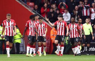 Southampton celebrate in front of Saints fans at St Mary's