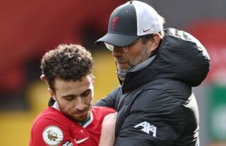 Liverpool manager Jurgen Klopp hugs Diogo Jota