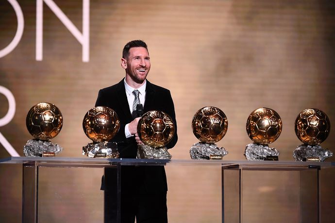 Messi with his six Ballon d'Or awards - a record in football.