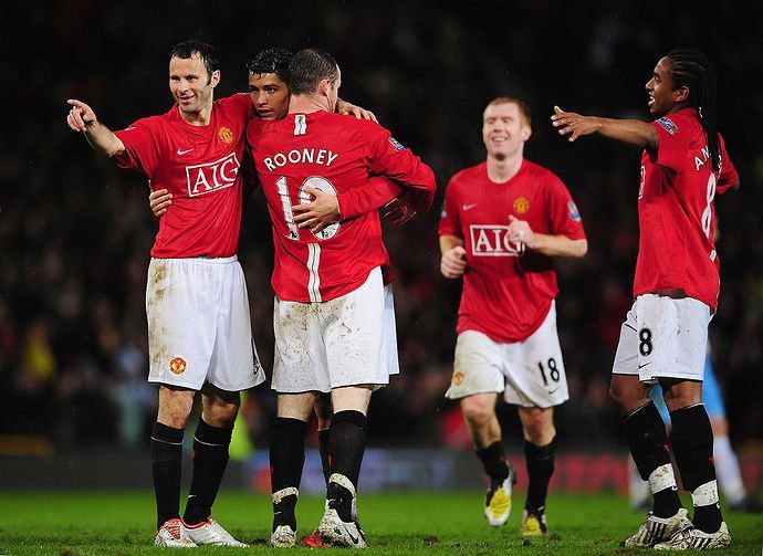 Cristiano Ronaldo celebrates with Wayne Rooney and Man Utd teammates