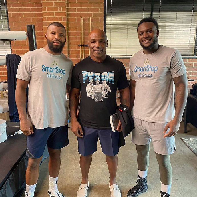 Viddal Riley, Badou Jack and Mike Tyson pictured together in 2019