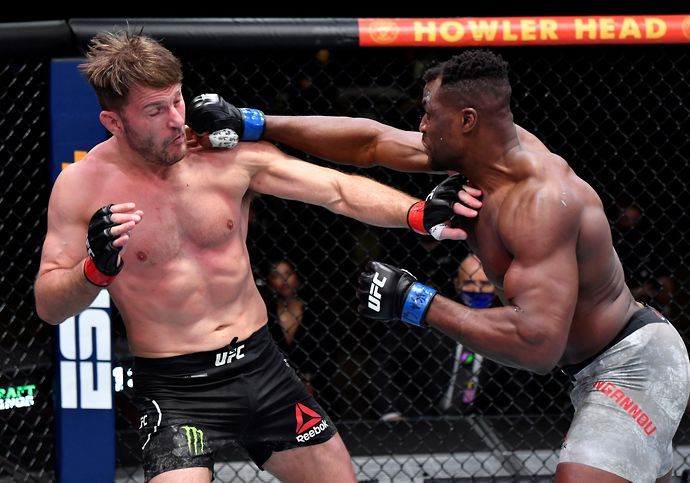 Francis Ngannou throws a punch at Stipe Miocic