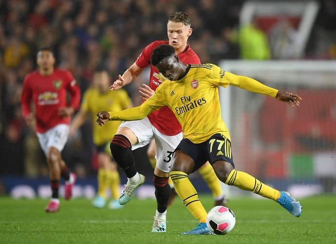 Bukayo Saka in action against Manchester United