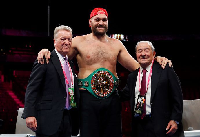 Tyson Fury pictured with his promoters Bob Arum and Frank Warren