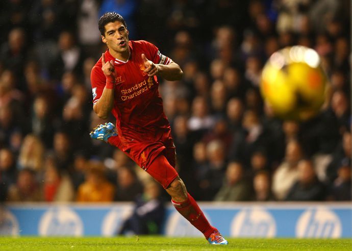 Luis Suarez scoring for Liverpool.