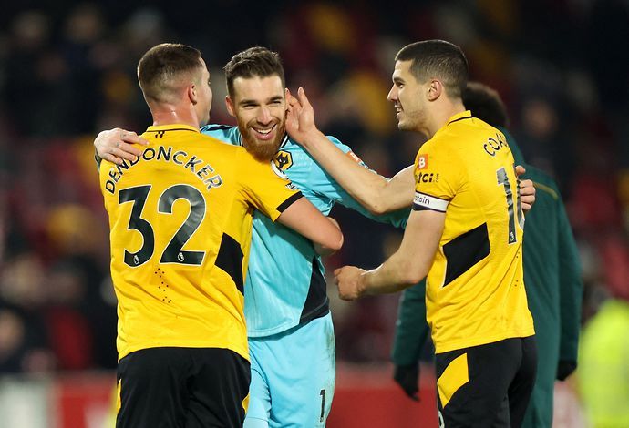 Josa Sa celebrates with Dendoncker and Coady after Brentford 1-2 Wolves