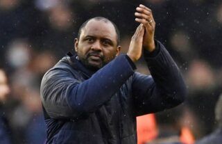 Crystal Palace boss Patrick Vieira applauds the supporters