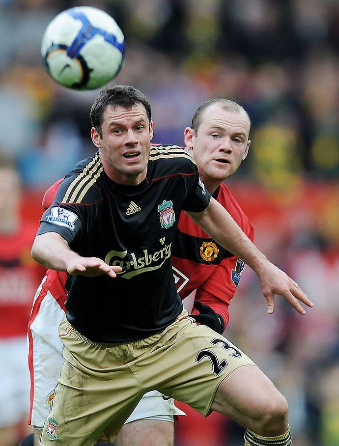 Carragher & Rooney in action