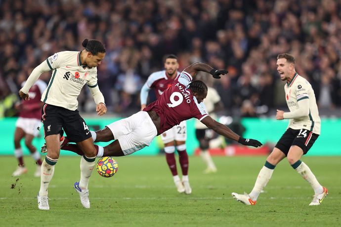 Virgil van Dijk and Michail Antonio in action during West Ham vs Liverpool