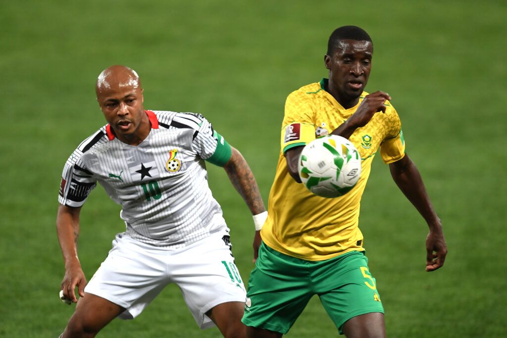 Andre Ayew of Ghana and Siyanda Xulu of South Africa during the 2022 FIFA World Cup Qualifier match