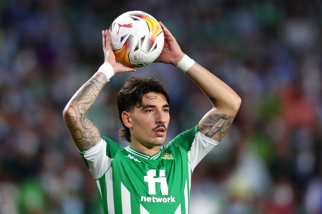 Hector Bellerin of Real Betis prepares to take a throw in.